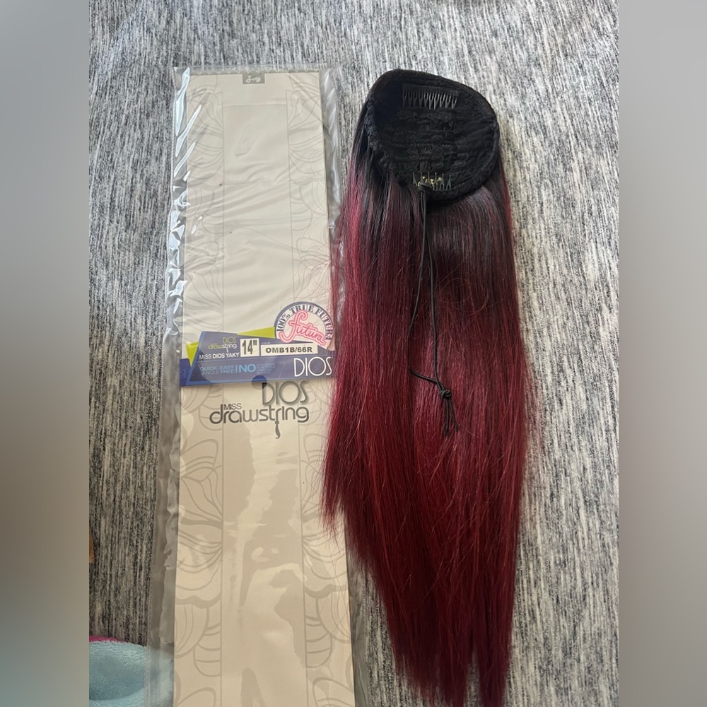 Burgundy ponytail wig. Never used but open.
